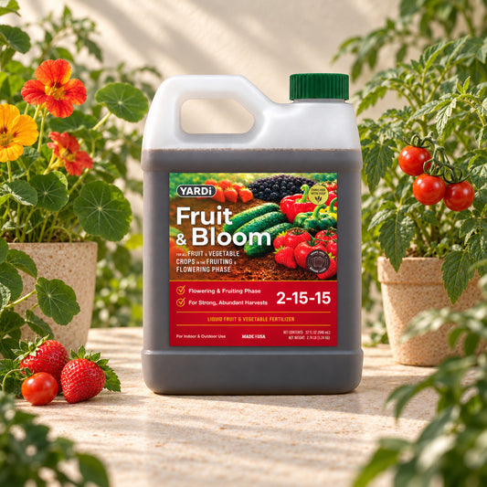 YARDi Fruit & Bloom 2-15-15 liquid fertilizer 32 oz bottle among tomatoes, nasturtiums and strawberries